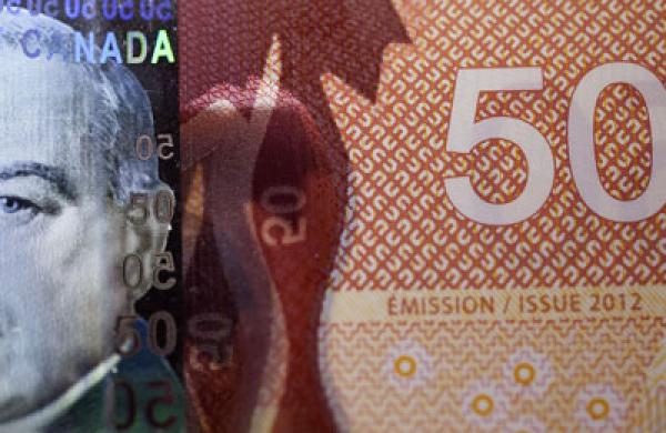 Canada's Dollar at Almost Eight-Month Low Before Economic Report