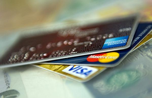 Consumers Use Credit Cards To Buy Necessities As Inflation Crimps Income