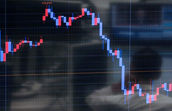 Dealers At Foreign Exchange Brokerage As Japanese Stocks Retreat On Higher Yen