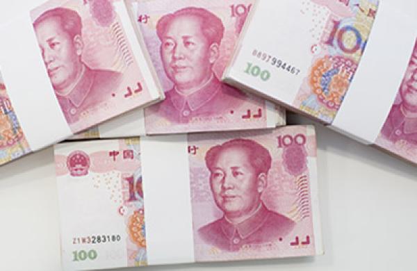 Renminbi Notes At a Standard Chartered Plc Branch As Currency to Start Direct Trading With Kiwi Dollar