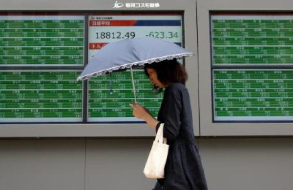 2015-08-da-global-market-pessimism-tokyo-large.jpg