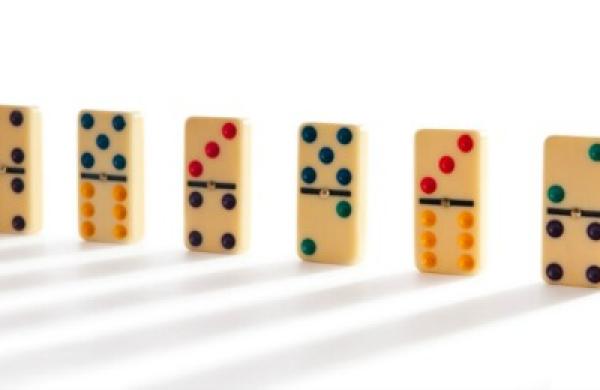 2015-11-uw-samuel-malone-emerging-markets-risk-dominoes-large.jpg