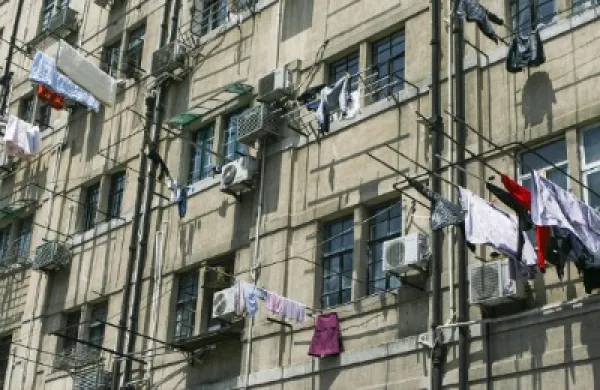 2016-08-da-china-housing-shanghai-apartment-building-large.jpg