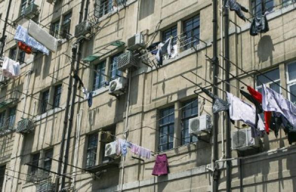 2016-08-da-china-housing-shanghai-apartment-building-large.jpg