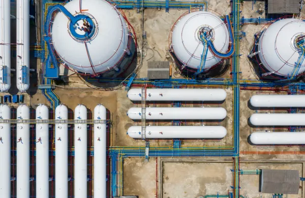 Aerial view white storage tank gas in station LPG gas, LNG or LPG distribution station facility, Oil and gas fuel manufacturing industry.