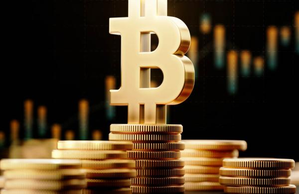 Bitcoin Symbol With Financial Chart Over Dark Background