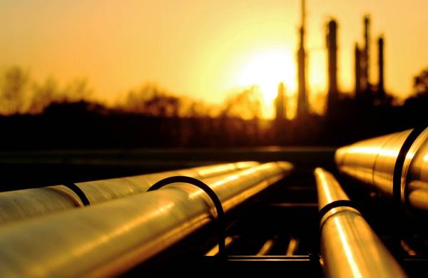 Golden pipes going to oil refinery