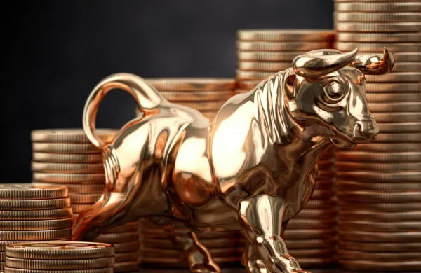 Golden bull and coins . Financial investment in bull market and growth of stock market concept.
