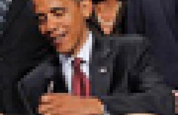 60x60-obamasignsbill.jpg