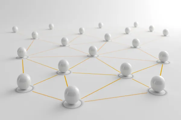 Multiple white spheres connected by thin yellow lines in a network pattern.