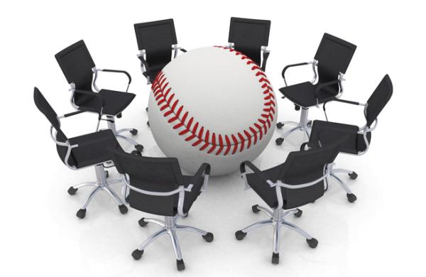 young businessmen playing baseball in officebaseball bat