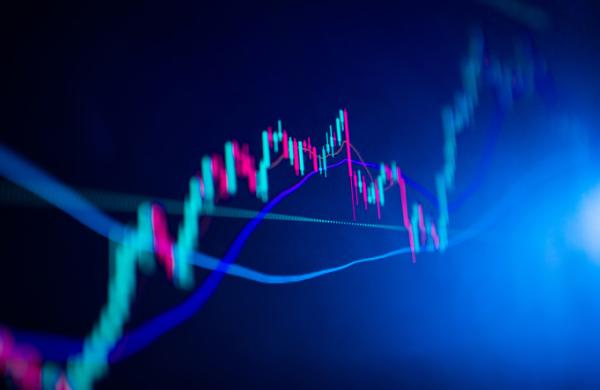 The market volatility of crypto trading with technical price graph and indicator, red and green candlesticks, for analysis up and downtrend. Stock trading, crypto currency background concept.