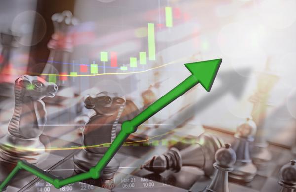 Stock market capital gains and money earned from investing.  Upswing concept with money in hand for USD rising and financial firms earning millions.