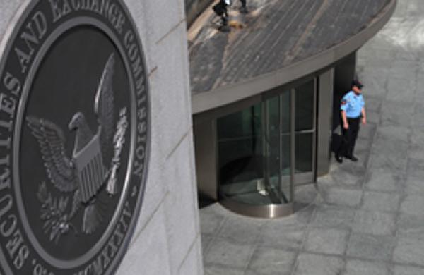 A security officer stands outside the U.S. Securities and Exchange Commission headquarters