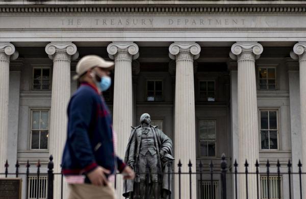 Andrew Harrer/Bloomberg