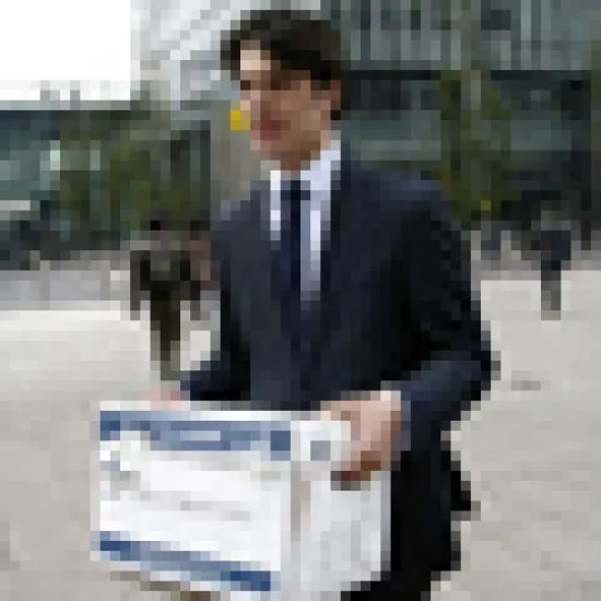 A Lehman Brothers employee carries a box away from the office of the U.S. investment bank in London A Lehman Brothers employee carries a box away from the office of the U.S. investment bank in London