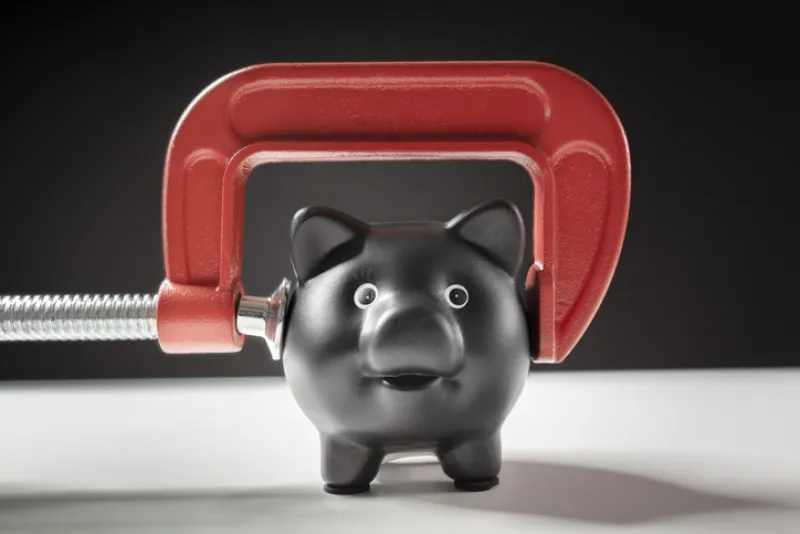 Squeeze on piggy bank