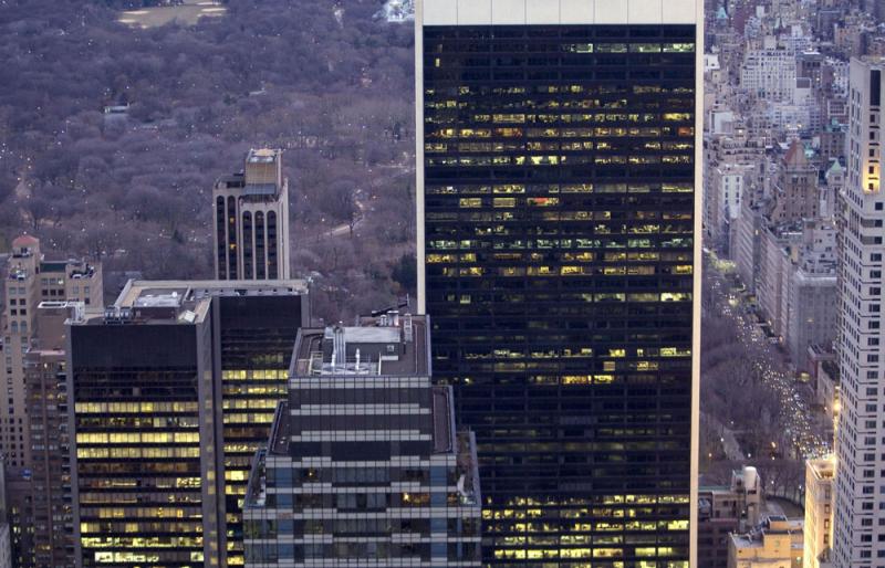 Apollo headquarters (right) in New York City. (Andrew Harrer/Bloomberg News)