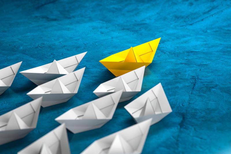 Leadership, success, and teamwork concept, yellow leader paper boat leading white followers boats. 3D Render Leadership, success, and teamwork concept, yellow leader paper boat leading white followers boats. 3D Render