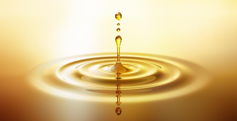 Moisturizing cosmetic oil drop with ripples Moisturizing cosmetic oil drop with ripples